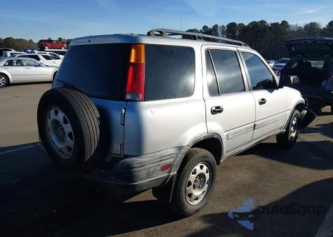 1999 Honda Cr-V Lx z USA, uszkodzony, nr VIN JHLRD2840XC007640